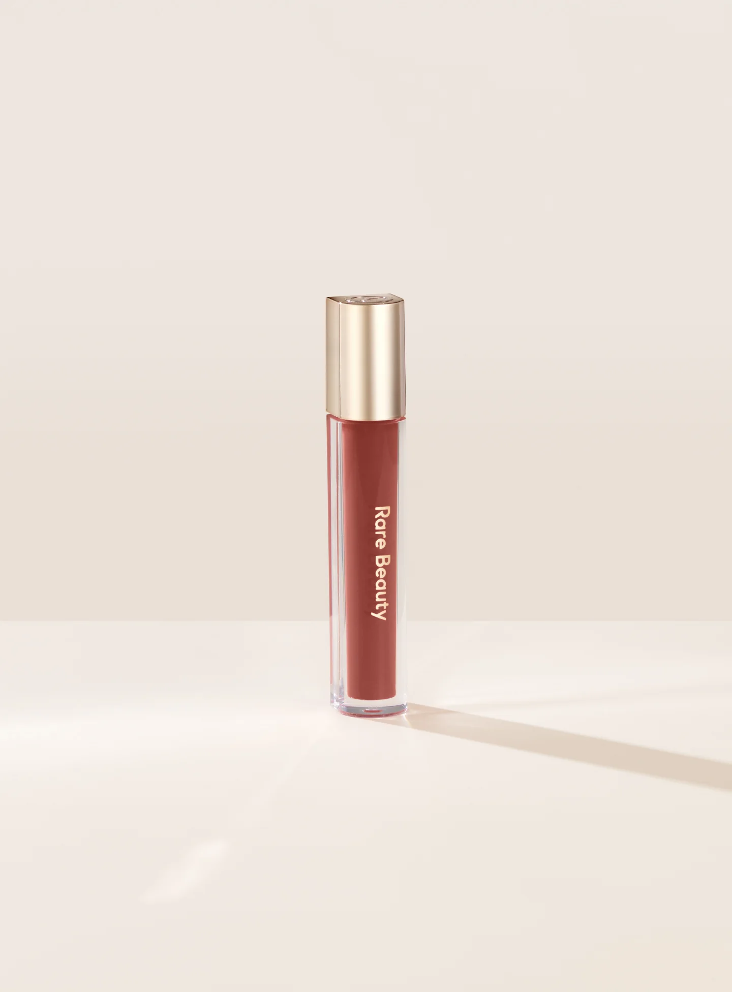 RARE BEAUTY STAY VULNERABLE GLOSSY LIP BALM - NEARLY NEUTRAL