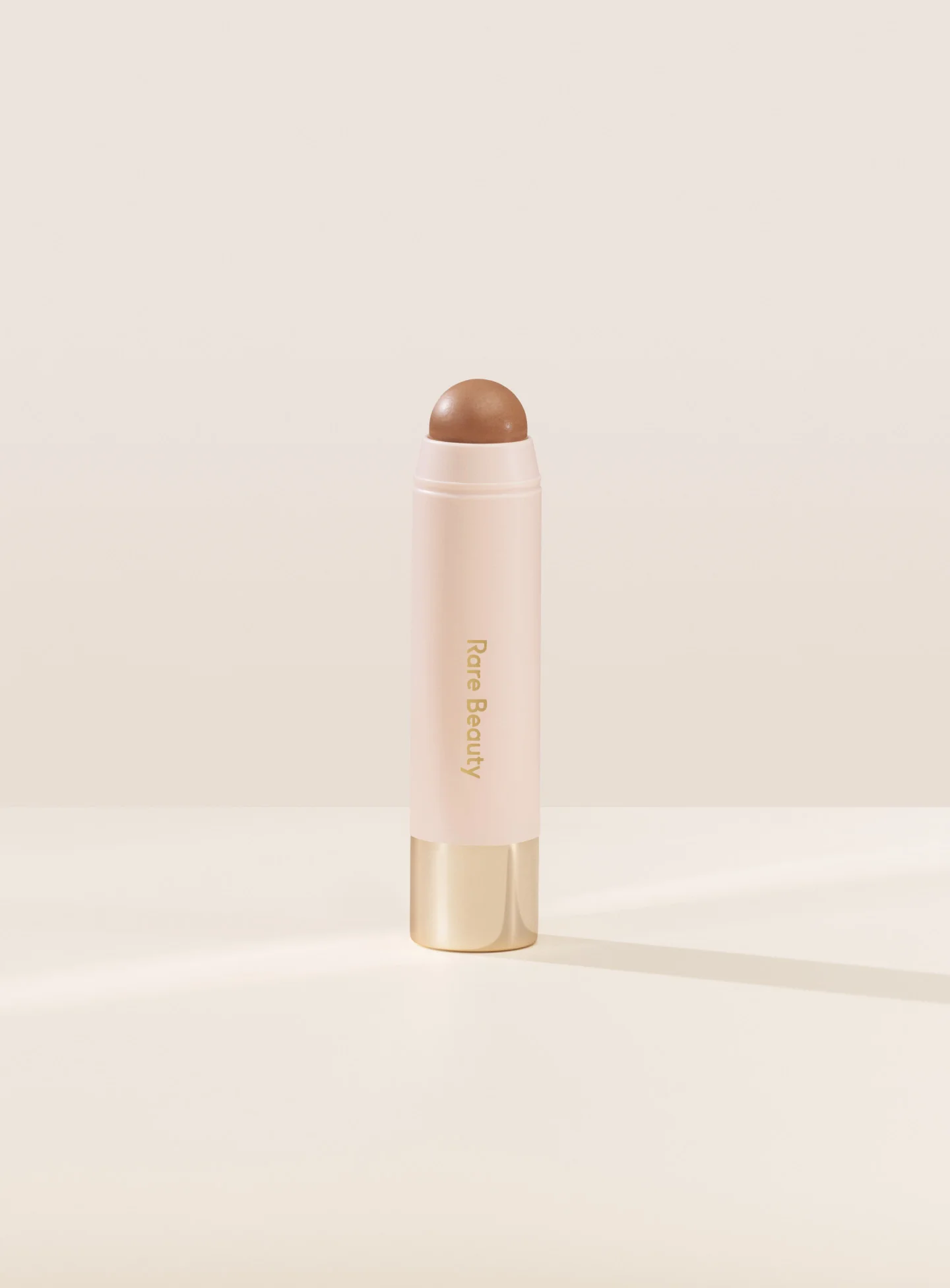 RARE BEAUTY WARM WISHES EFFORTLESS BRONZER STICK - HAPPY SOL