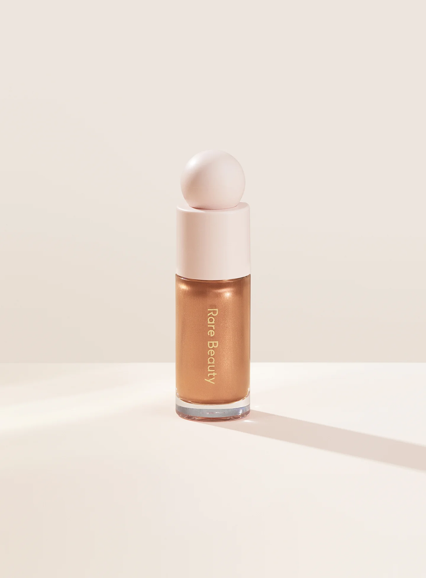 RARE BEAUTY POSITIVE LIGHT LIQUID LUMINIZER - FLAUNT